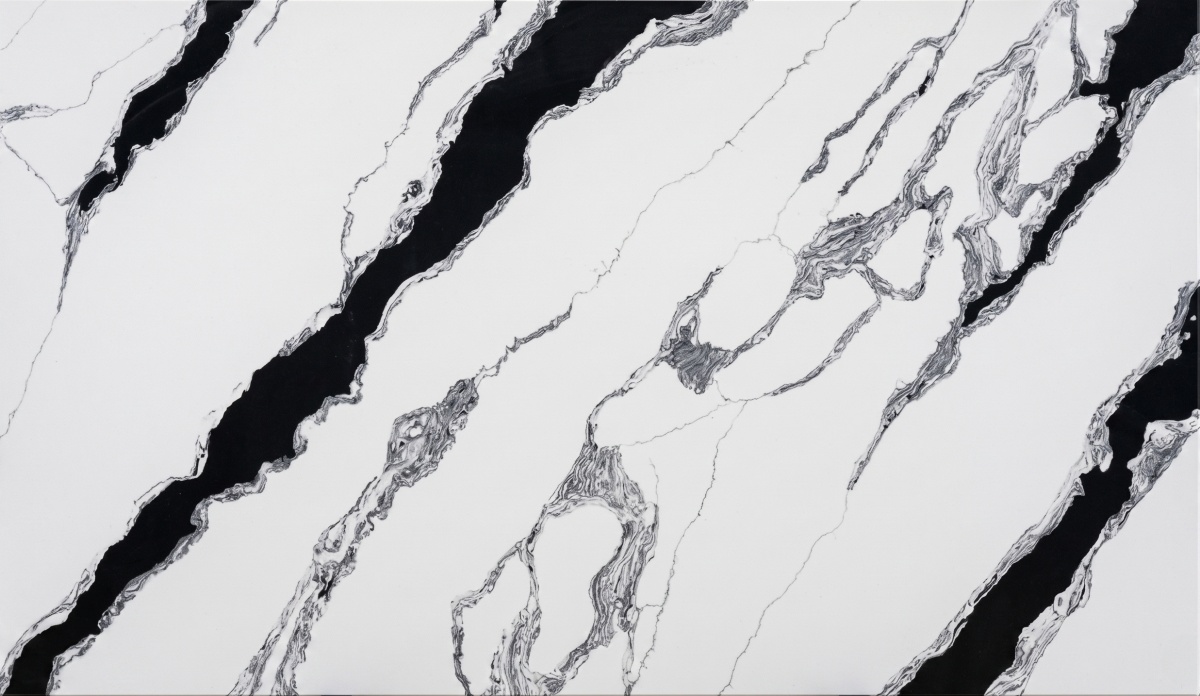 White engineered quartz slab with bold panda-style black veins