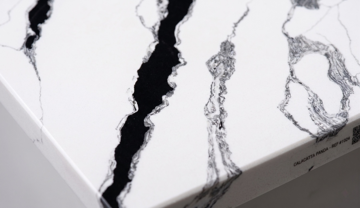 Close-up detail of Panda White quartz grey layered vein edges