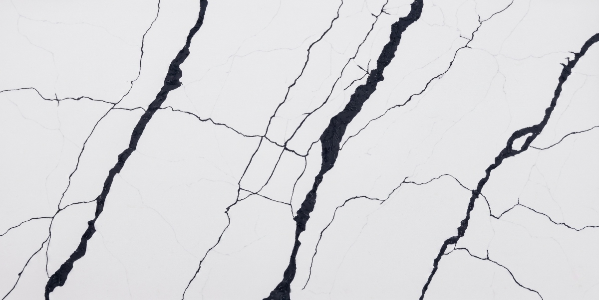 Steel Rift White Quartz close-up showing dark rift veining and fine crack lines