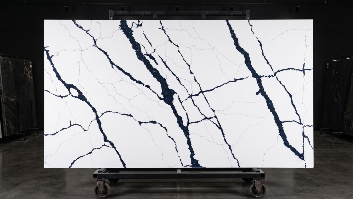 Full slab display of Arctic Rift Quartz on metal rack Full slab display of Arctic Rift Quartz on metal rack