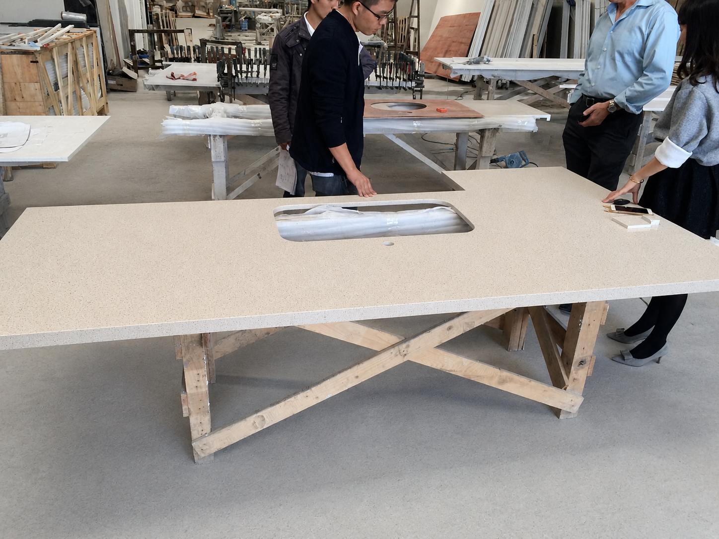 Aoli Stone team inspecting fabricated quartz vanity countertops for a U.S. multifamily project Aoli Stone team inspecting fabricated quartz vanity countertops for a U.S. multifamily project