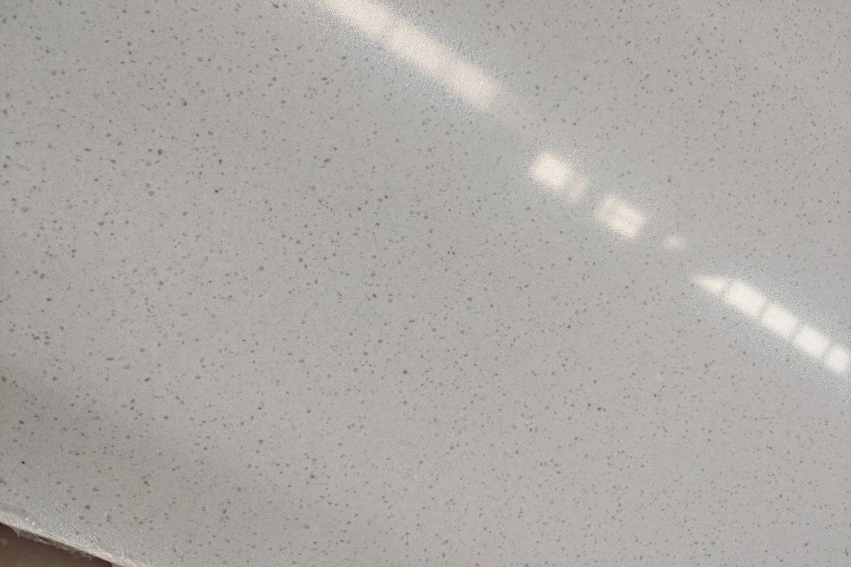 commercial-white-artificial-marble-texture-close-up Close-up texture of Commercial White Artificial Marble with fine grey particles