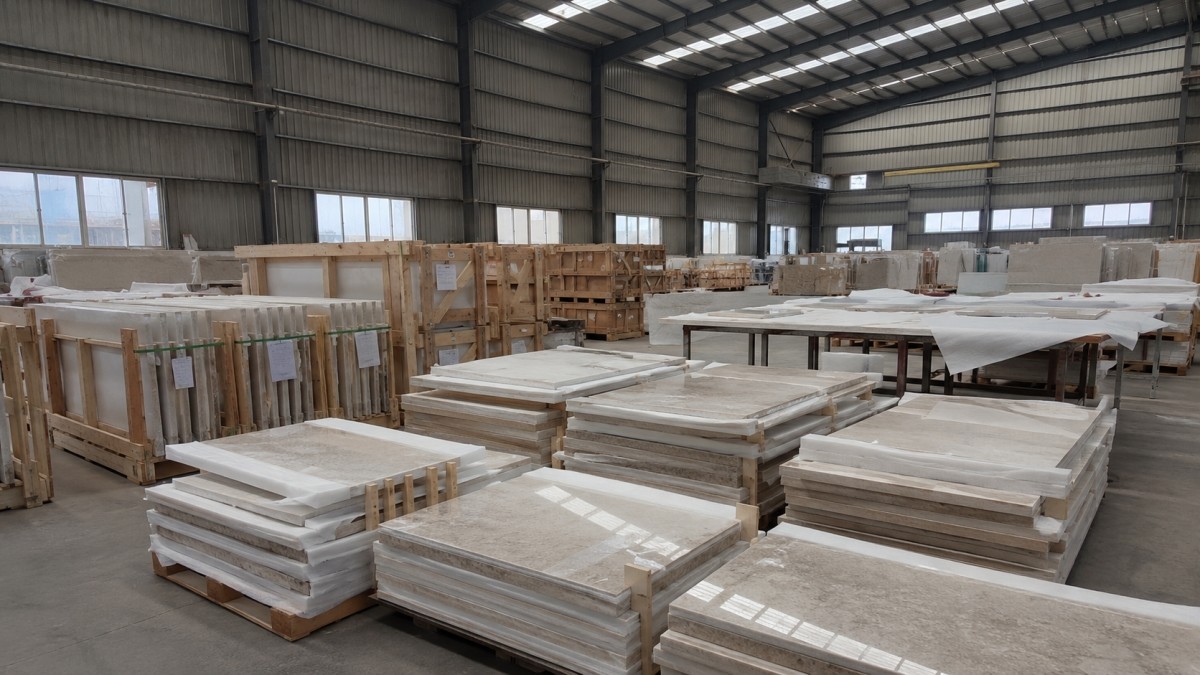 Cut-to-size stone pieces grouped and packed by project area for export
