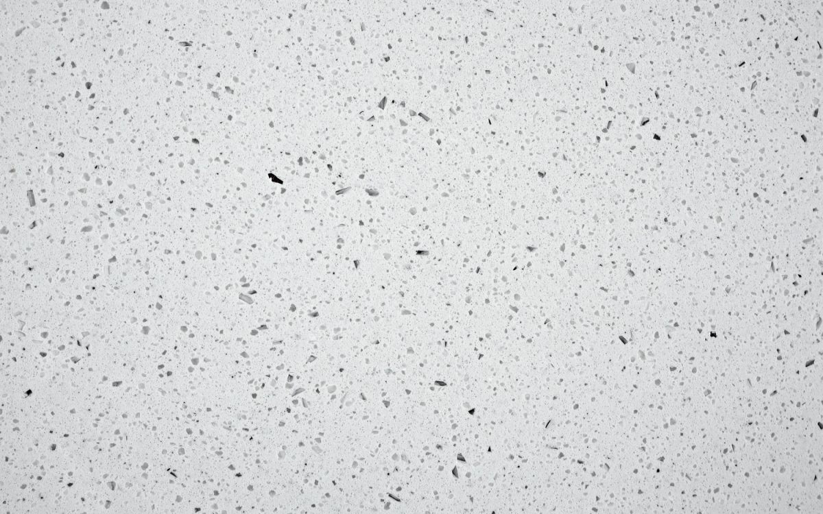 sparkle-white-artificial-marble-texture-close-up Close-up texture of Sparkle White Artificial Marble with small grey specks
