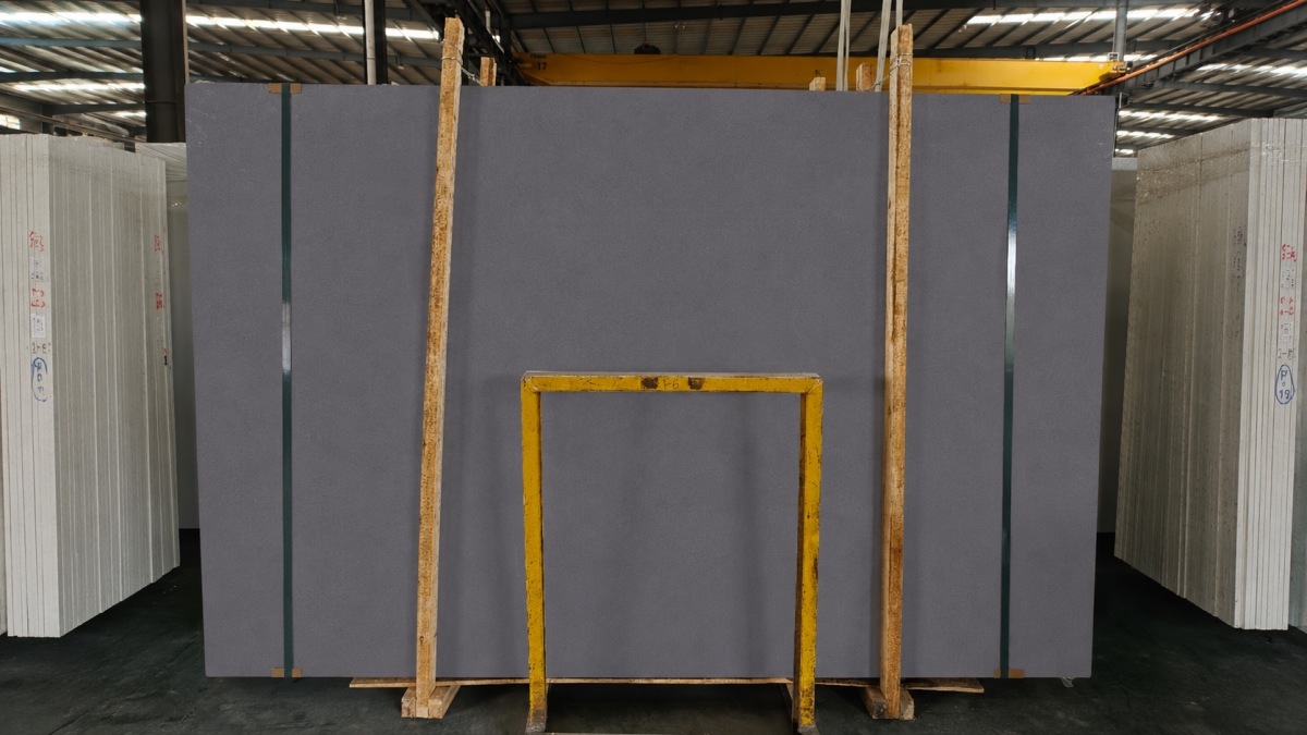 deep-grey-artificial-stone-uniform-grain-slab Deep grey artificial stone slab with uniform fine grain texture