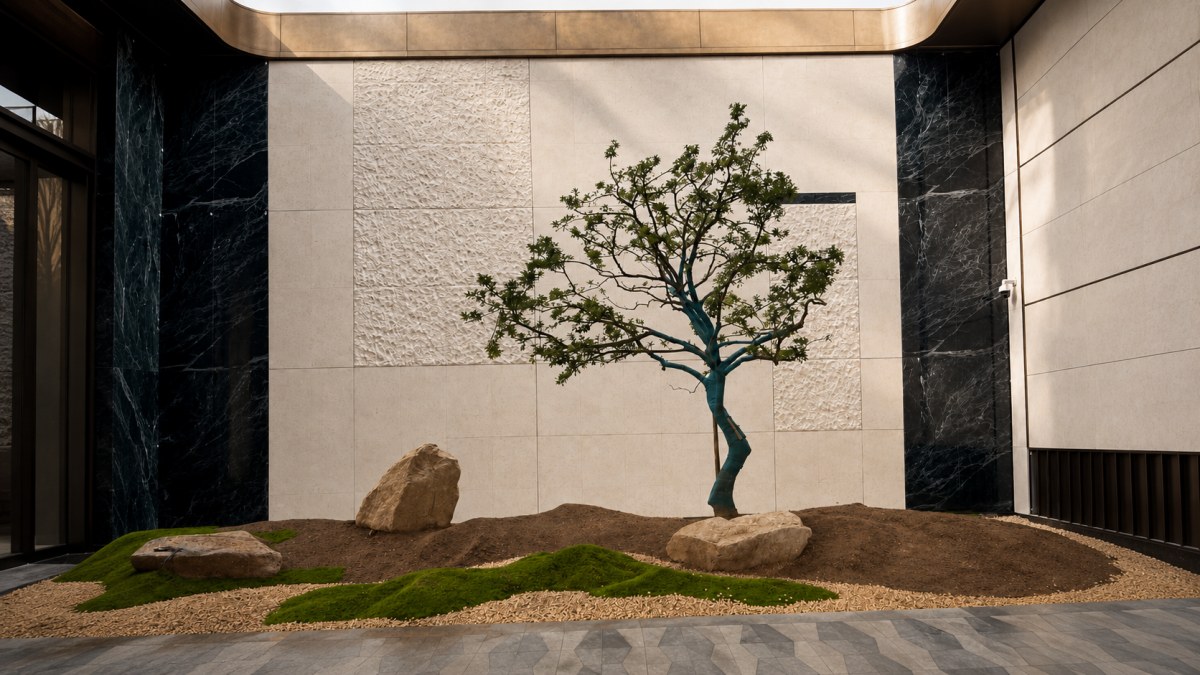 cotswold-cream-limestone-interior-entrance-wall-cladding Cotswold Cream Limestone wall cladding in an interior entrance area with bronze metal and stone flooring