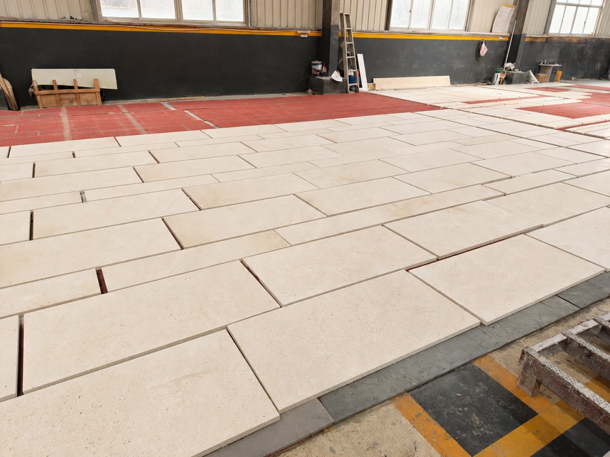 cotswold-cream-limestone-cut-to-size-dry-layout-inspection Cotswold Cream Limestone cut-to-size panels arranged for dry layout inspection before project delivery