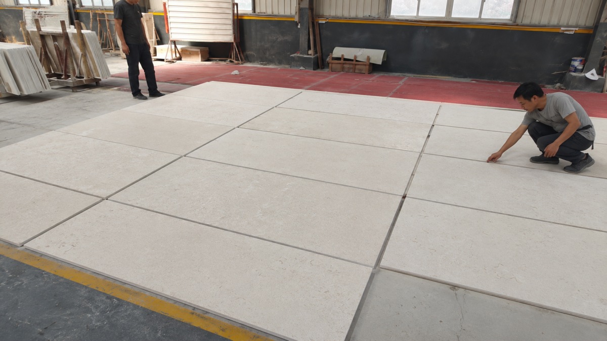 moonlight-beige-limestone-cut-to-size-panels Cut-to-size Moonlight Beige limestone panels for wall and flooring projects, showing controlled dimensions, fossil texture, and natural beige tone.