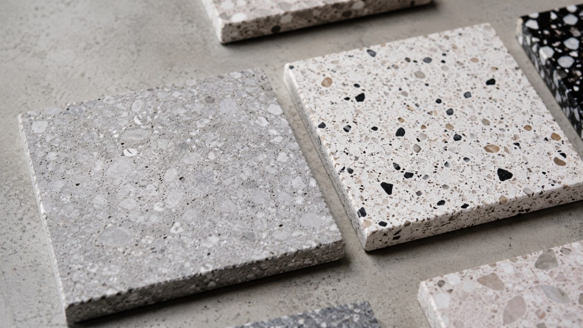 terrazzo-binder-system-comparison Terrazzo samples showing different binder systems and aggregate appearance