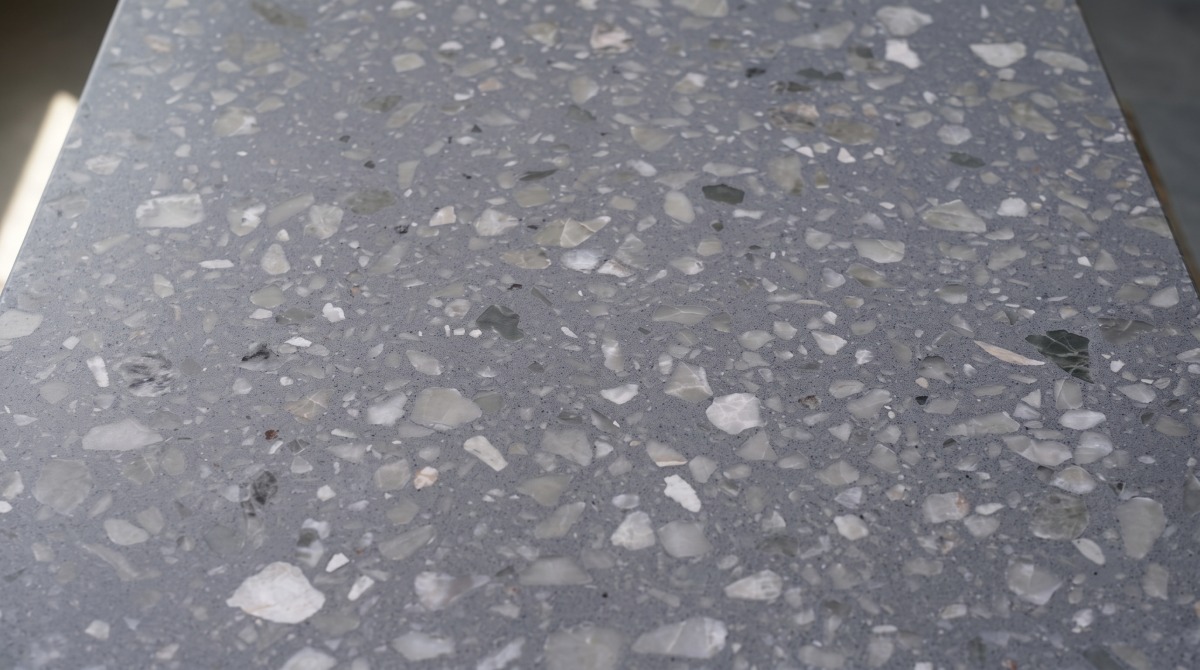 anna-grey-terrazzo-finish-angle Anna Grey terrazzo surface finish under controlled angled light