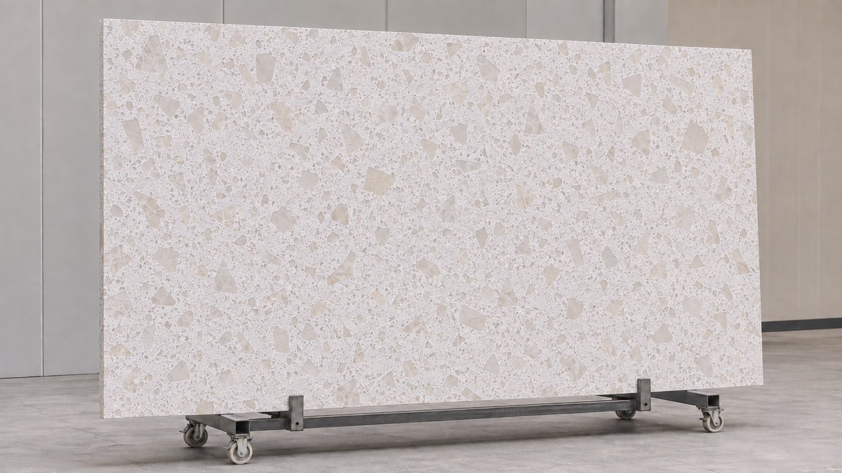 magnolia-white-large-chip-terrazzo-full-slab Full slab of Magnolia White terrazzo showing warm-white background and mixed-scale pale beige aggregate distribution
