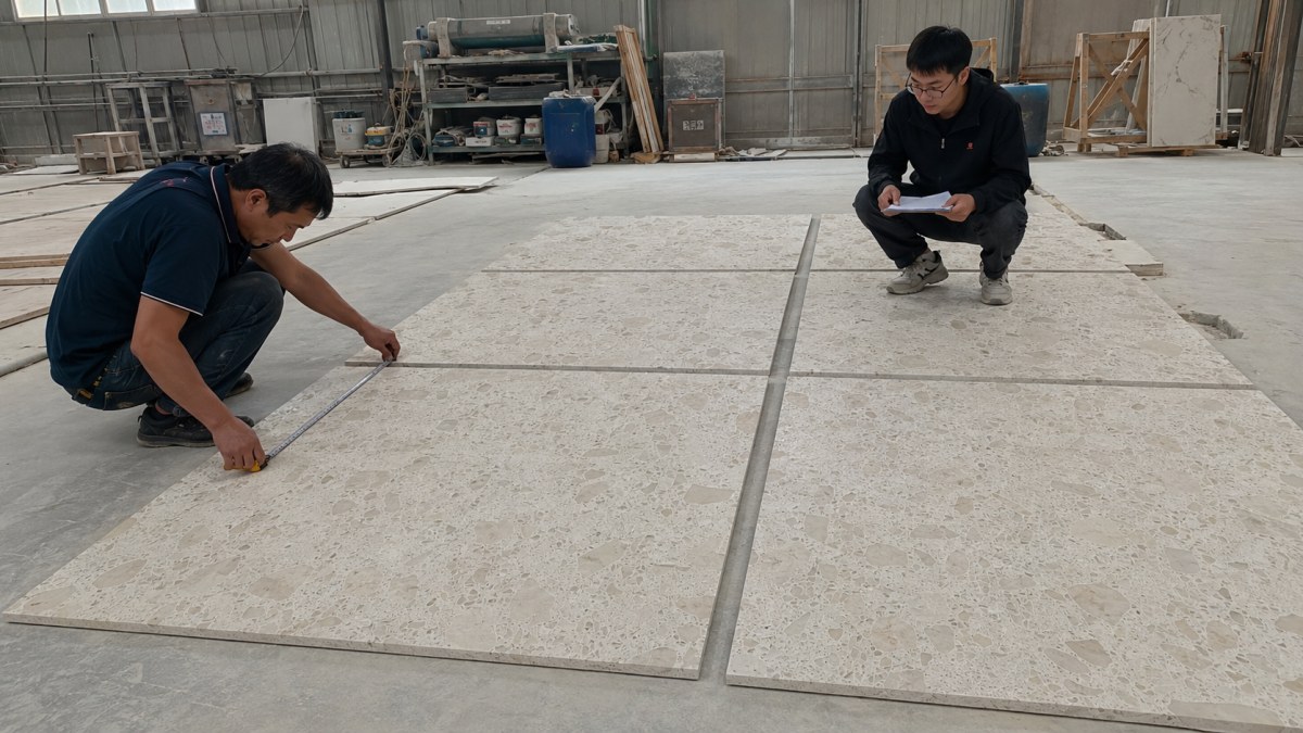 magnolia-white-terrazzo-dry-lay-inspection Dry lay inspection of Magnolia White terrazzo cut-to-size pieces before packing
