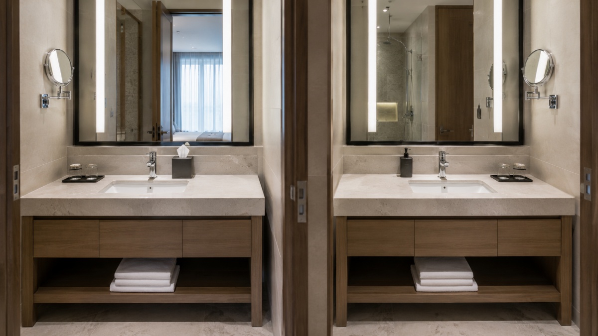 hotel-bathroom-stone-vanity-repeatability Repeated hotel bathroom stone vanity tops with consistent cutouts edges and dimensions